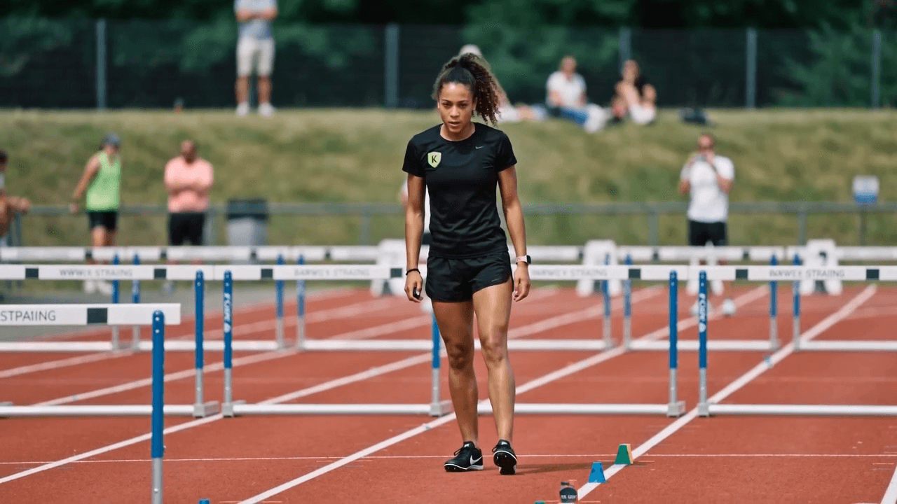 Bounding drill demonstration frame from the AI-generated track coaching clip